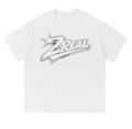 White t-shirt with '2 Real' logo on a white background